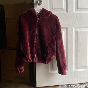 Size medium in teens. Color burgundy .